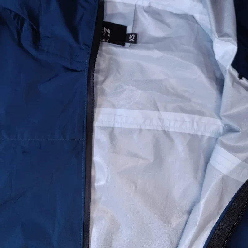 Rompeviento Alpen Outdoor Iguazú - Azul Petróleo - Impermeable y Ultra Liviano - Imagen 5